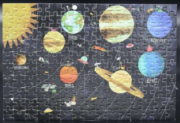 Dieses Londji-Puzzle zeigt das Discovery-Motiv The Planets – Ein Blick ins Universum in 150 Teilen.